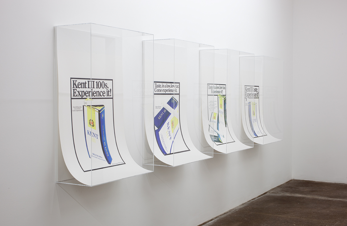 David Catherall, installation view. Left to right: KENT III Experience / Taste: KENT III 100s Experience It; KENT III Come Experience It; KENT III Taste Experience It; KENT III Experience It, each 2012. Silkscreen on Design Offset, Naturweiß 300 gm. paper, plexiglas. 47 ¾ x 29 x 12 inches each. 47 ¾ x 151 ¼ x 12 inches installed.