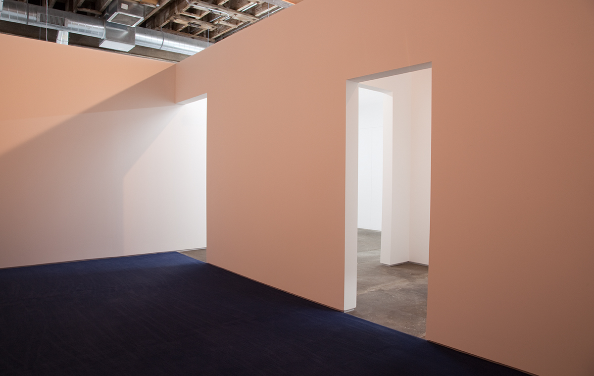 44.989569 x -93.252357, 2012. Wood, sheetrock, metal reglets, latex paint, carpet, daylight fluorescent tubes, and halogen spots. 120 x 330 x 376 inches.